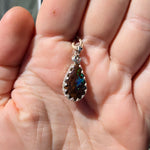 Shimmering Drop Boulder Opal Pendant in Sterling Silver