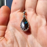 Shimmering Drop Boulder Opal Pendant in Sterling Silver