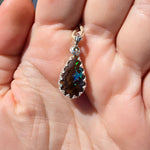 Shimmering Drop Boulder Opal Pendant in Sterling Silver