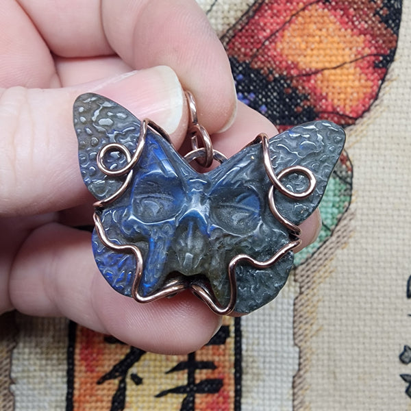 Carved Blue Labradorite Skull Butterfly Pendant in Copper